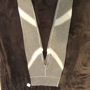Grey athletic leggings with mesh paneling